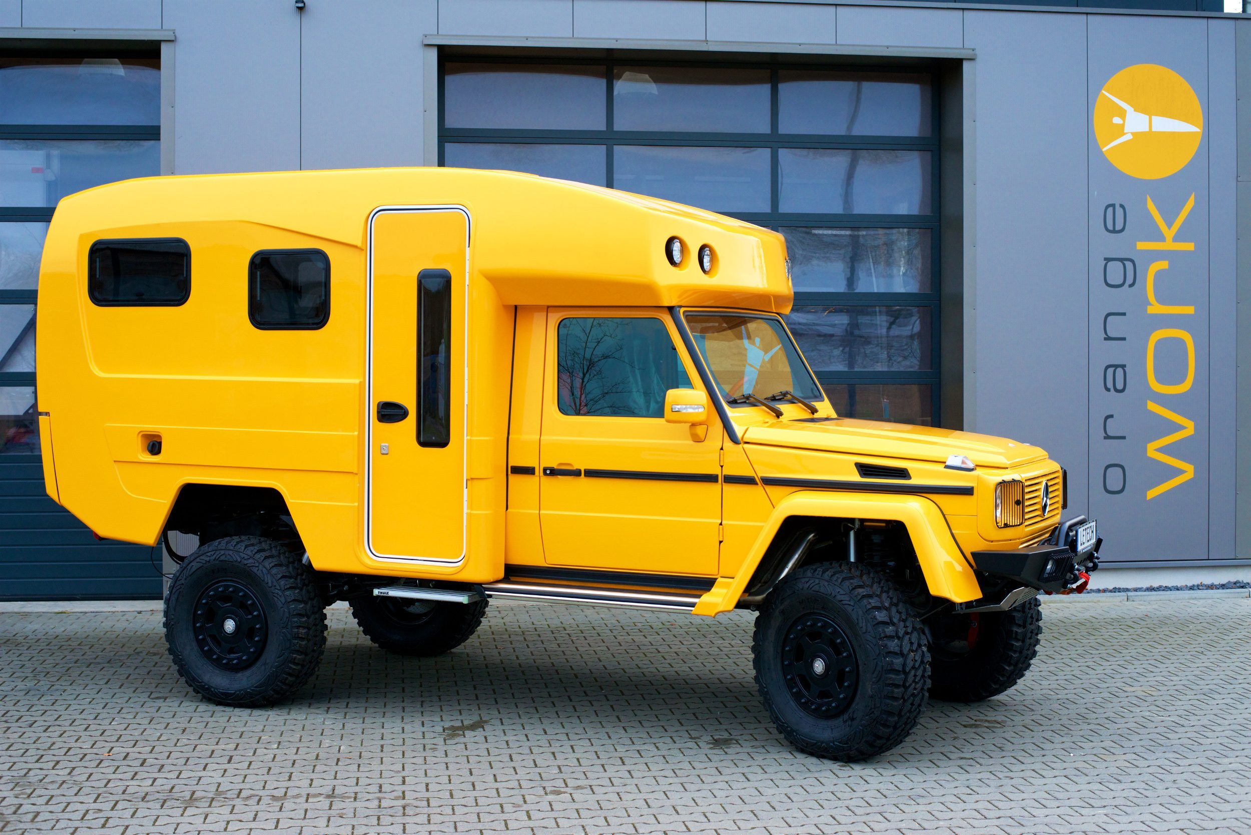 off road trucks - Yellow ExpeditionMobil