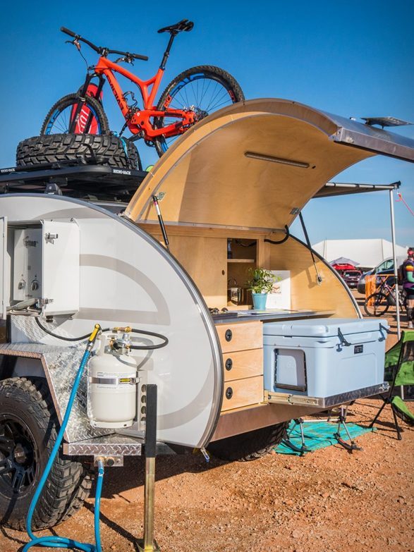 Best Teardrop Trailers - Escapod trailer with kitchen open and bike on roof