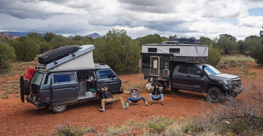 Toyota Tundra Camper with an off-road VW relaxing