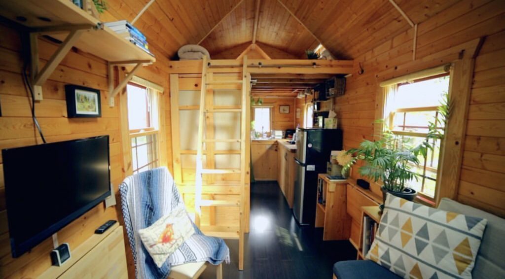 Wooden interior of tiny home. 