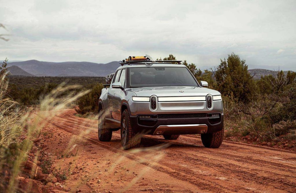 Rivian Electric Truck on a dirt road 
