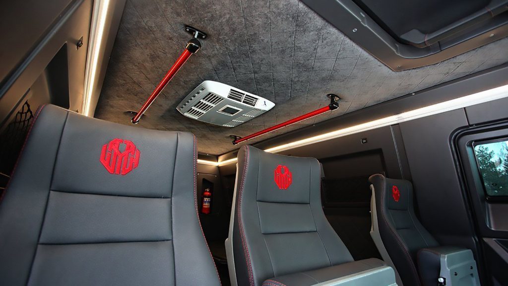 Avtoros Shaman interior seats with embroidered logo and leather plush material. 