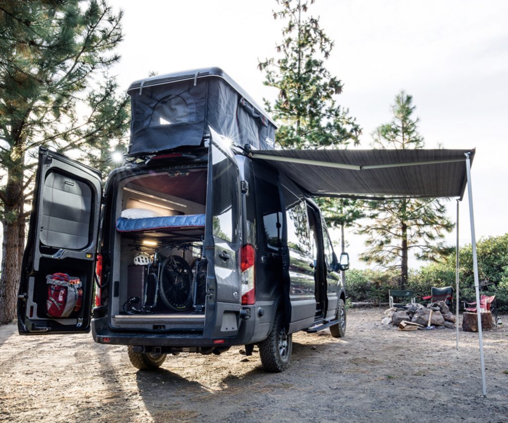   Best Adventure Vans - Exterior of Cascade by Outside Van with roof tent open and awning out 