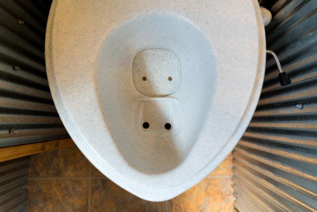 Two compartments on the natures head toilet