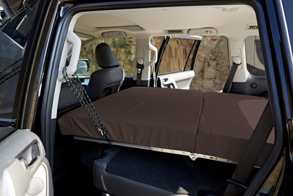 SUV camper conversion kit - bed extended in car 