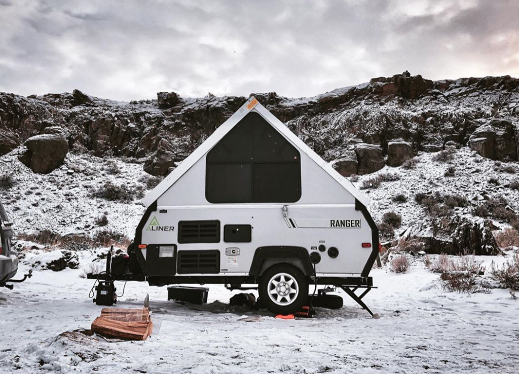A frame camper in the snow