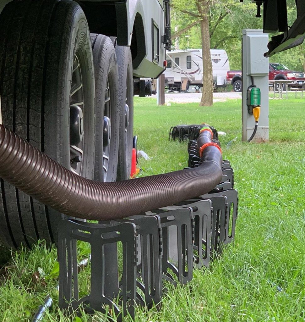 RV sewer hose connected to a tank