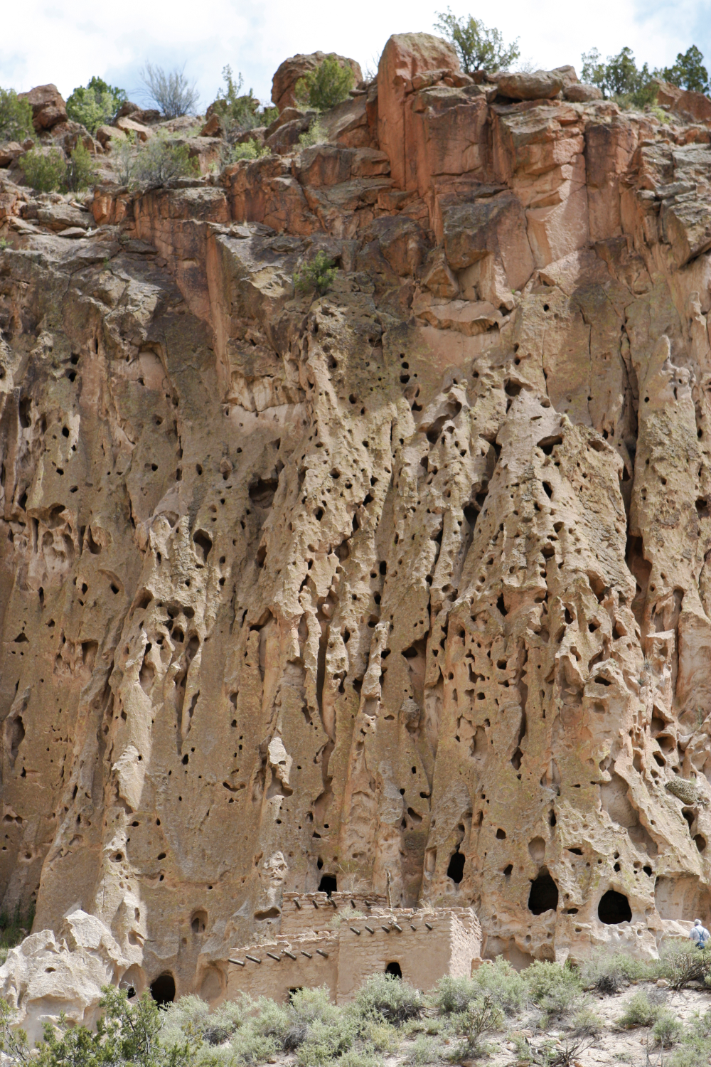 Holes in canyon walls at Bandelier National Monument